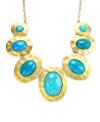 Accent any look with a bold statement maker. Style&co.'s stunning necklace features seven oval-shaped drops with turquoise-hued plastic beads. Set in gold tone mixed metal. Approximate length: 18 inches + 2-inch extender. Approximate drop: 6 inches.