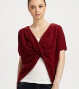 This v-neck, twist-front cashmere topper is perfect for snuggling luxuriously.CashmereShort sleevesPullover styleHand wash or dry cleanImported