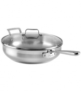 A real stove topper! Emeril packs professional promise & outstanding performance into this stainless steel sauté pan. A brilliant base of aluminum and stainless captures heat fast and spreads it evenly, while the glass lid traps in vital moisture, flavor and nutrients to each and every meal. Lifetime warranty.