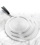 Get in and out of the kitchen quick with a stainless steel splatter guard that keeps your food where it belongs-in the pan! The universal guard fits 8 to 13 pans, featuring a perforated design that eliminates mess and has a stay-cool silicone handle for easy use. 10-year warranty.