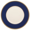 Inspired by privately commissioned presidential dinnerware, this fine china features stately navy bands and a gold border etched with patriotic stars.