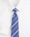 Tonal stripes sharpen a classic tie woven in Italy from silk. About 3 wideSilkDry cleanMade in Italy