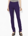 Rendered in sleek stretch cotton, an elegant pant is crafted with a slim straight leg and equestrian-inspired details.