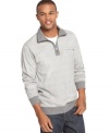 With a sporty quarter-zip style, this Geoffrey Beene sweater puts some zip on your weekend wardrobe.