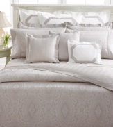 A tonal stripe design in a muted palette offers a look of serene elegance in this Suite Mink pillowcase from Lauren by Ralph Lauren. Finished with a medallion paisley design along hem for added style.