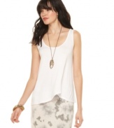 A spring staple, this Kensie tank features a slouchy fit & asymmetrical hem for an easy, casual-cool look!