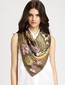 A sumptuous silk scarf dips into the wild with an abstract jungle print.SilkAbout 36 X 36Dry cleanMade in Italy