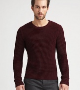 Merino wool makes this classic crewneck irresistible.CrewneckPull-on styleRibbed trimMerino woolDry cleanImported of Italian fabric