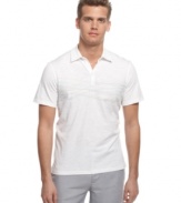 Not your basic polo. A graphic front adds a modern touch to this classic shirt from Calvin Klein.