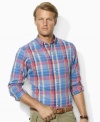 A trim-fitting sport shirt in lightweight brushed cotton twill exudes authentic character with a heritage plaid pattern.