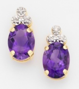 Couple cool amethyst with glittering diamonds to make her February birthday - or any event - special. Multifaceted oval-cut amethyst are crowned with round-cut diamond accents and set in 14k gold. For pierced ears only.