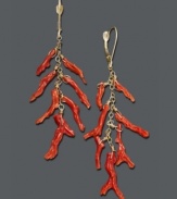 Bring new life to your wardrobe with underseas style! These fresh earrings feature bright coral branches suspended from a 14k gold chain and setting. Approximate drop: 2-1/2 inches.