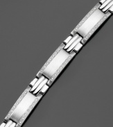 Smooth, stylish stainless steel is highlighted by the beauty of round-cut diamonds (1 ct. t.w.) on this stunning bracelet. Approximate length: 8-1/2 inches.