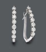 Turn heads with these tantalizing hoop earrings. Crafted in 14k white gold, earrings feature seven certified near colorless diamonds (1 ct. t.w.) in a neat row. Approximate diameter: 3/4 inch.