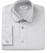 The classic, with a dose of high style. Set yourself apart with this French-cuffed shirt from Calvin Klein.