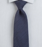 Diagonal stripes define this beautifully woven wool and silk tie.About 3 wide65% wool/35% silkDry cleanMade in Italy