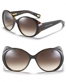 MARC BY MARC JACOBS' timeless oversized sunglasses boast elegant appeal.