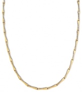 Golden and glamorous, this stylish X-patterned necklace dazzles with diamond accents. Crafted from 14k gold. Approximate length: 17 inches. Approximate width: 1/8 inch.