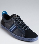 Suede and leather combine in alternating panels for an intriguing take on the everyday sneaker by Paul Smith.