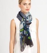 A hand-printed, colorful abstract print adorns a woven scarf.Viscose40 X 74Hand washImported