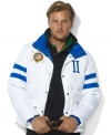 In celebration of the St. Moritz Polo World Cup on Snow, support your country of choice in a lightweight team racer jacket with bold athletic stripes, a snow polo crest and the country name and flag patch at the back.