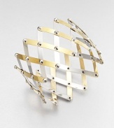 Silver studs connect bands of sterling silver, some with goldplating, in a striking wide, woven trellis pattern.Sterling silver and 18k goldplated sterling silverDiameter, about 4 (adjustable)Width, about 2¼Made in Italy