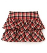 Perfect with a button down shirt, long sleeve tee or cardigan, this season-right Juicy Couture plaid skirt refreshes the classic style with tiered ruffle styling.