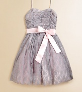 A delicate lace overlay and charming sash tie lend sweet princess style to this dreamy frock.Sweetheart necklineAdjustable shoulder strapsConcealed back zipperWaistband with sash tieFull skirt with tulle underlayFully linedNylon/polyester/spandexDry cleanMade in the USA