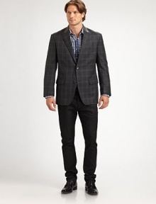 Decorative leather trim at the collar styles a handsome sportcoat design patterned with classic windowpane print in superior wool.Button-frontNotch lapelChest welt, waist flap pocketsSide ventsWoolDry cleanImported