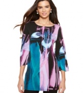 A floral print in bright watercolors makes for a perfect feminine tunic to wear this Spring. From Alfani.