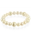 Elegance defined. This pretty stretch bracelet combines cultured freshwater pearls (8-10 mm) and cubic zirconia accents in a polished 18k gold over sterling silver setting. Approximate length: 7-1/2 inches.