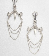 From the Superstud Collection. Beaded scrolls on top hold delicate, draped graduated chains in this sterling silver design that combines pretty shapes with edgy spike-and-stud details.Rhodium-plated sterling silverLength, about 2.5Post-and-hinge back with 14k yellow gold postImported