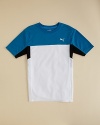 PUMA's stays on trend with this cool colorblock tee, designed for modern, high-performance style and comfort.