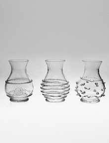 Tiny trio with a big presence, perfect for holding single blooms or small clusters of wild flowers. Mouthblown glass 3½ high Handmade Imported