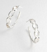 Beautifully brilliant clear quartz stones set in sleek sterling silver on a pretty hoop design. Clear quartzSterling silverLength, about 1.06Post backImported 