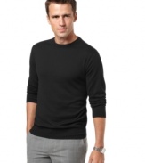 The crew neck and rich black color on this Perry Ellis sweater are what lend the piece an impression of calm and collectedness. Perfect for enjoying a day of tranquility while still looking sophisticated, this sweater will become an integral part of your wardrobe.