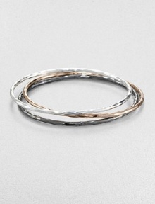 A beautiful blend of three stunning bangles in a chic, hammered texture. Sterling silverBlackened sterling silverSterling silver and 18k gold with 18k rose goldplatingDiameter, about 2.5Slip-on styleImported 