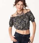 Show off your shoulders in this waist-revealing cropped top from Free People. The peasant styling adds a boho-chic touch!