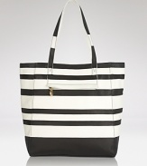 Stripes go from seaworthy to statement making with this leather tote from Pour La Victoire. It exudes carryall cool whether you're on-duty or dashing downtown for drinks.