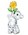 Enough to brighten anyone's day, this cute Kris Bear figurine shines in fully faceted Swarovski crystal. A gleaming yellow sunflower adds to his charm.