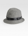 Check cotton bucket hat with embossed trademark. Leather trim Made in Italy 