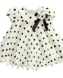 Adorable dress with dots galore and rose ribbon detail by Bonnie Baby.