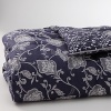 A rich tapestry of a woven floral pattern in soft cotton, this comforter has a beautiful pattern on both sides. Textured jacquard lays easy on indigo.