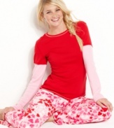 You'll instantly fall in love with the stylish comfort of this pajamas set by Jenni. The long-sleeve thermal top gives the illusion of layers, while the pretty prints on the bottom complete the look.