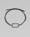 A knotted cord with a black diamond encrusted, 18K rose gold, rectangular link. Black diamonds, .28 tcw18K rose goldPolyester cordLink size, about ¾Length, about 13½ adjustableDrawstring closureImported 