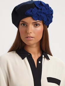 A retro-inspired, wool-blend knit topper with a pleated floral design.Pull-on style with concealed elastic bandWoolDry clean onlyImported