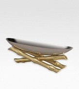 A sophisticated addition to any table, inspired by Asian culture in gleaming, 18/10 stainless steel with 24k goldplated bamboo feet. Food safe 12W X 4H X ½D Hand wash Imported 