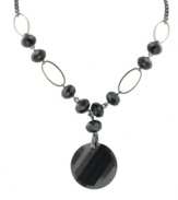 Well-rounded: Graceful oval shapes complement a dramatic circular pendant on 2028's Y necklace. Crafted in hematite tone mixed metal with jet beads. Approximate length: 16 inches + 3-inch extender. Approximate drop: 2 inches.