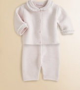 Baby will be cuddle-ready in this precious knit cotton set with smocked trim and matching pants.Round collarLong sleevesFront buttonsElastic waistCottonMachine washImported Please note: Number of buttons may vary depending on size ordered. 