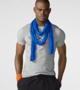 A sporty cotton jersey tee is adorned with vibrant race-inspired graphics for a modern, athletic look.